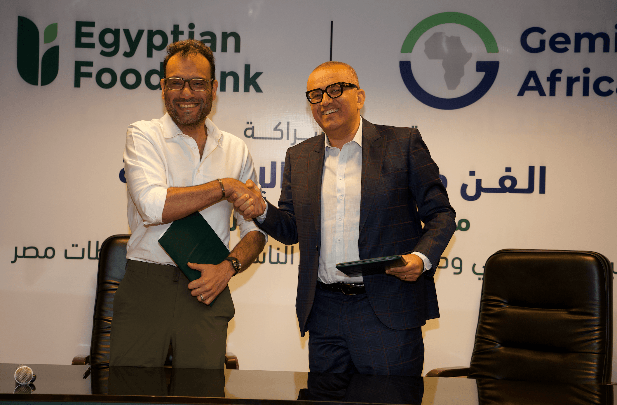 Mr. Mohsen Sarhan and Mr. Adly Thoma celebrate the signing of the “Art for Humanity” partnership between the Egyptian Food Bank and Gemini Africa.